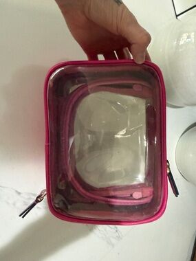Calpak Clear Travel Cosmetic Bag in Bright Pink (Small)